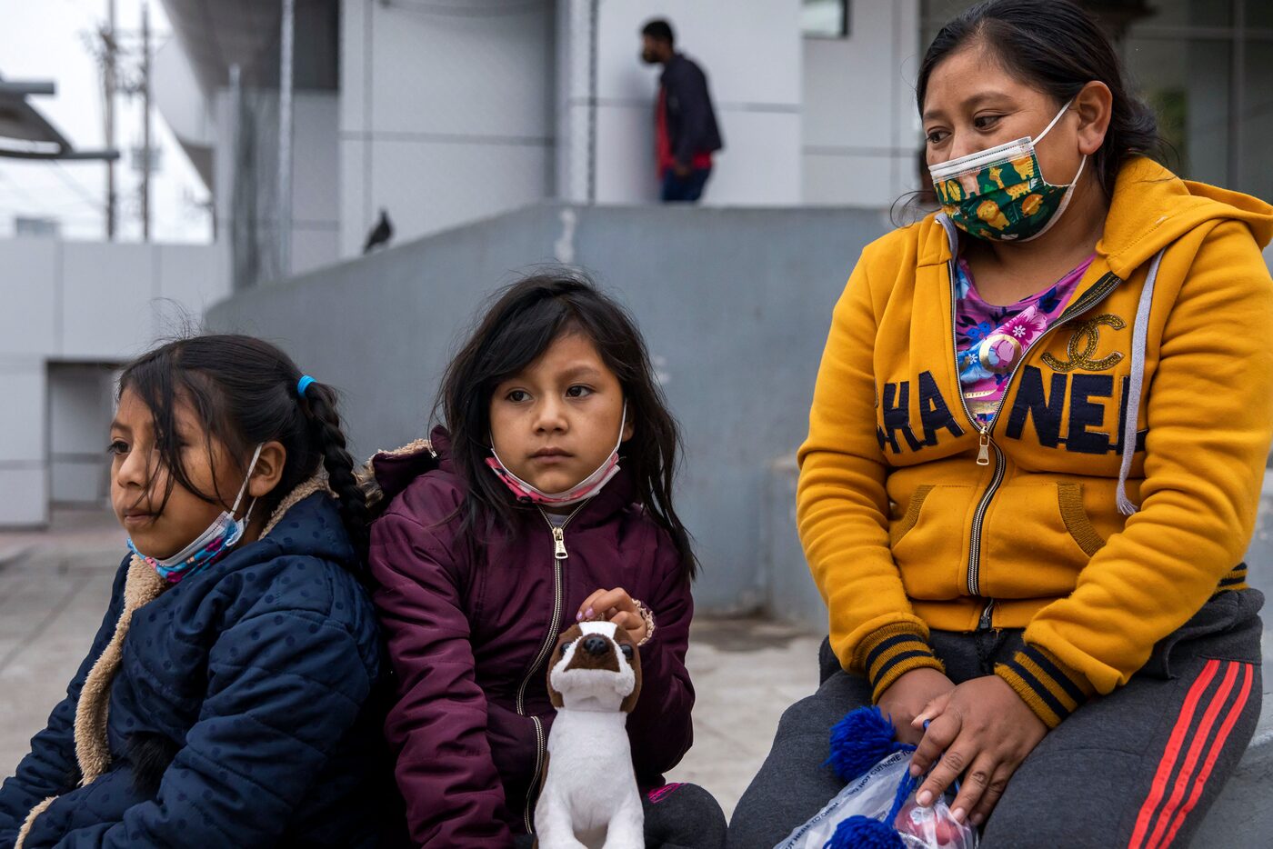 Isabela Julaj, right, sits with her daughters Yésica, (center) 7, and Maria Francela, 8,...