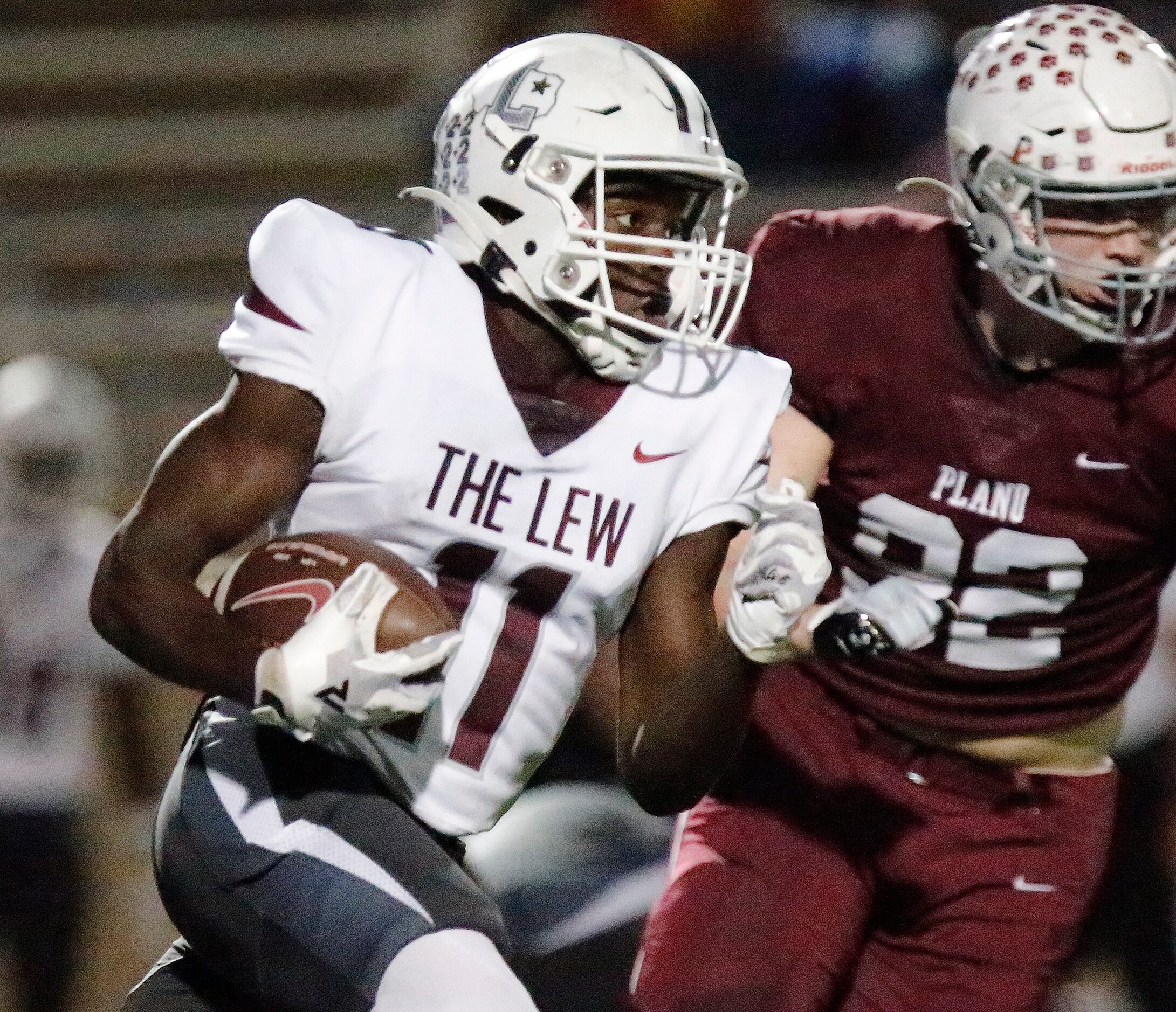 Lewisville High School running back Xavier Lewis (11) carries the ball during the first half...