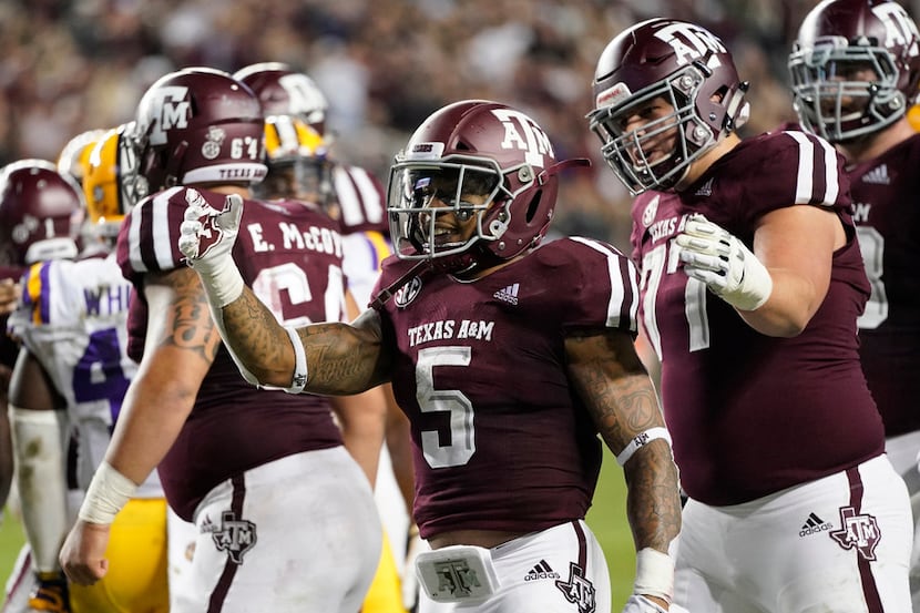 Texas A&M's Trayveon Williams (5) celebrates after rushing for a touchdown against LSU...