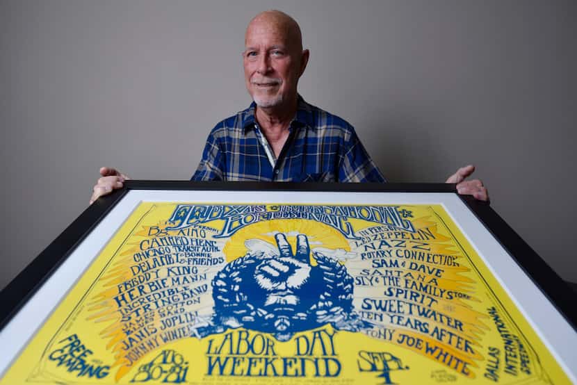 Angus Wynne III with an original poster of the Texas International Pop Festival, which...