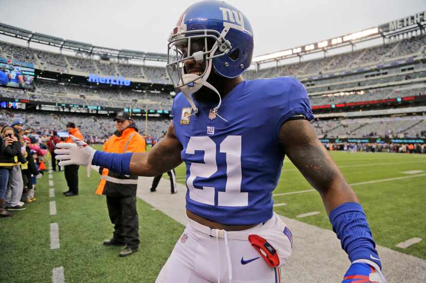 FILE - New York Giants' Landon Collins greets fans before an NFL football game against the...
