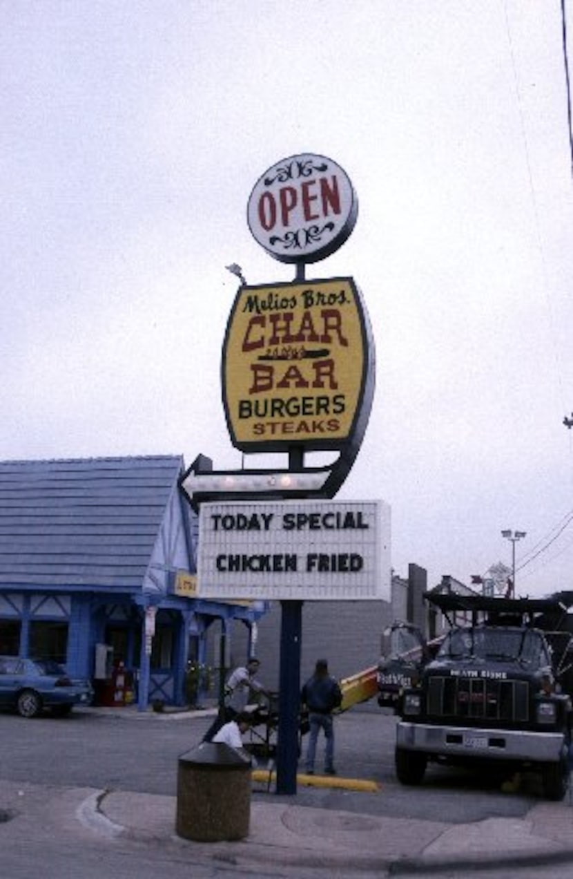 In 2002, the city of Dallas told the Melios brothers to remove their landmark sign, which...