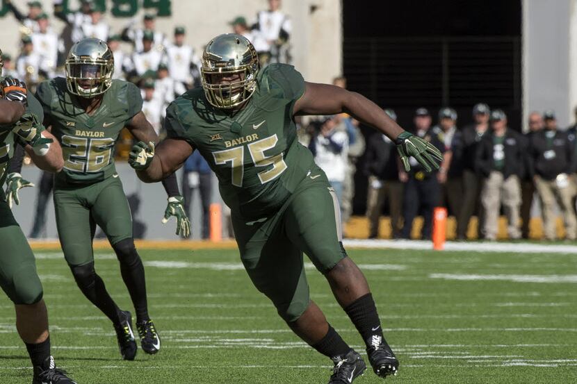 Baylor Bears defensive tackle Andrew Billings (75) rushes against the Texas Longhorns during...
