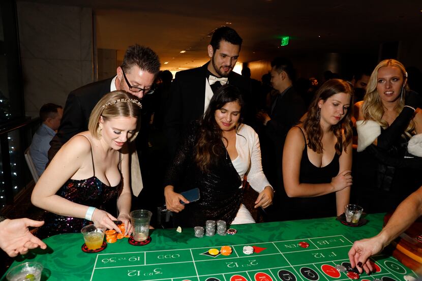 People play roulette on New Years Eve at the Statler in Dallas, Dec. 31, 2021. The Statler...