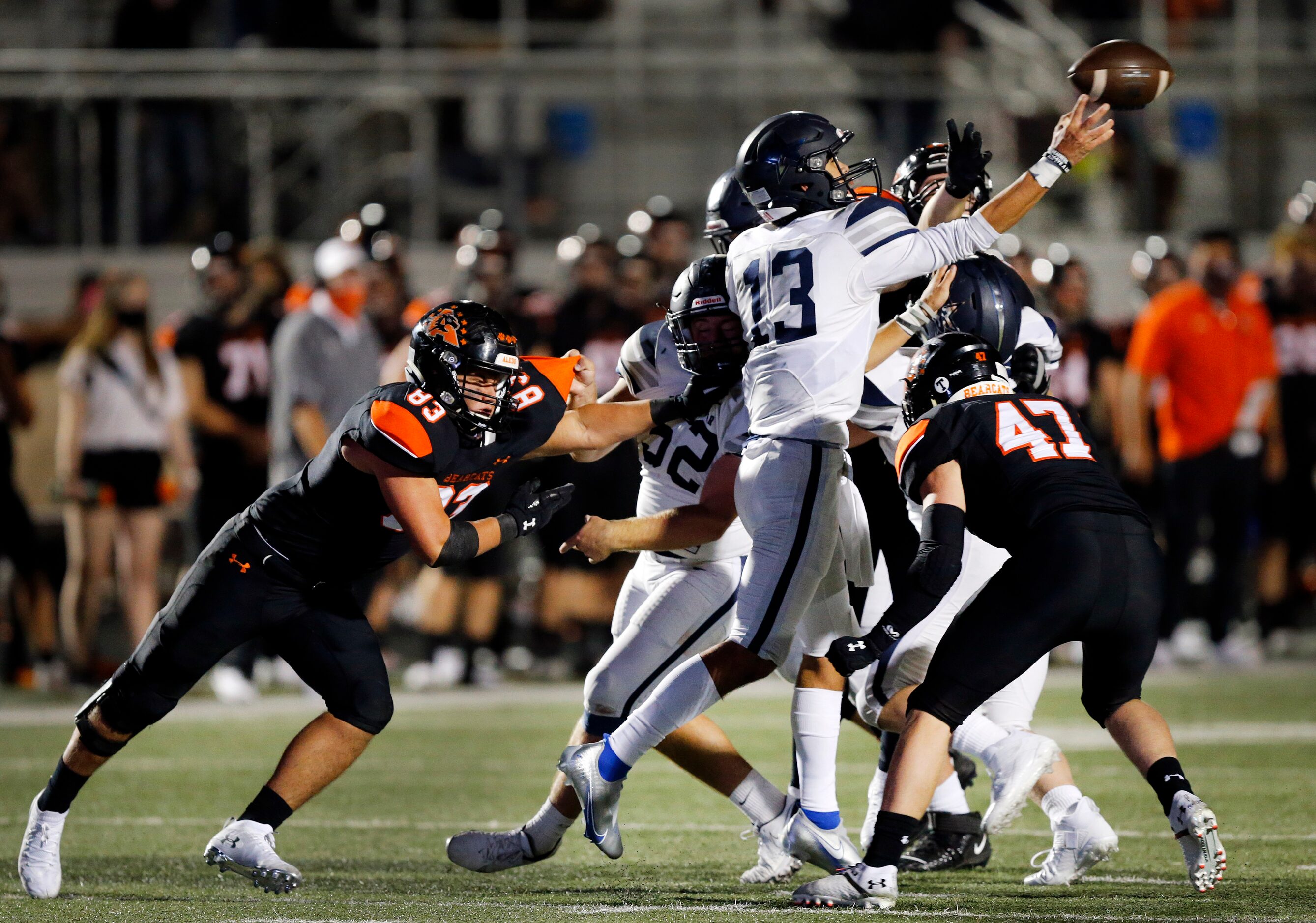 Frisco Lone Star quarterback Garret Rangel (13) throws from a collapsing pocket as Aledo's...