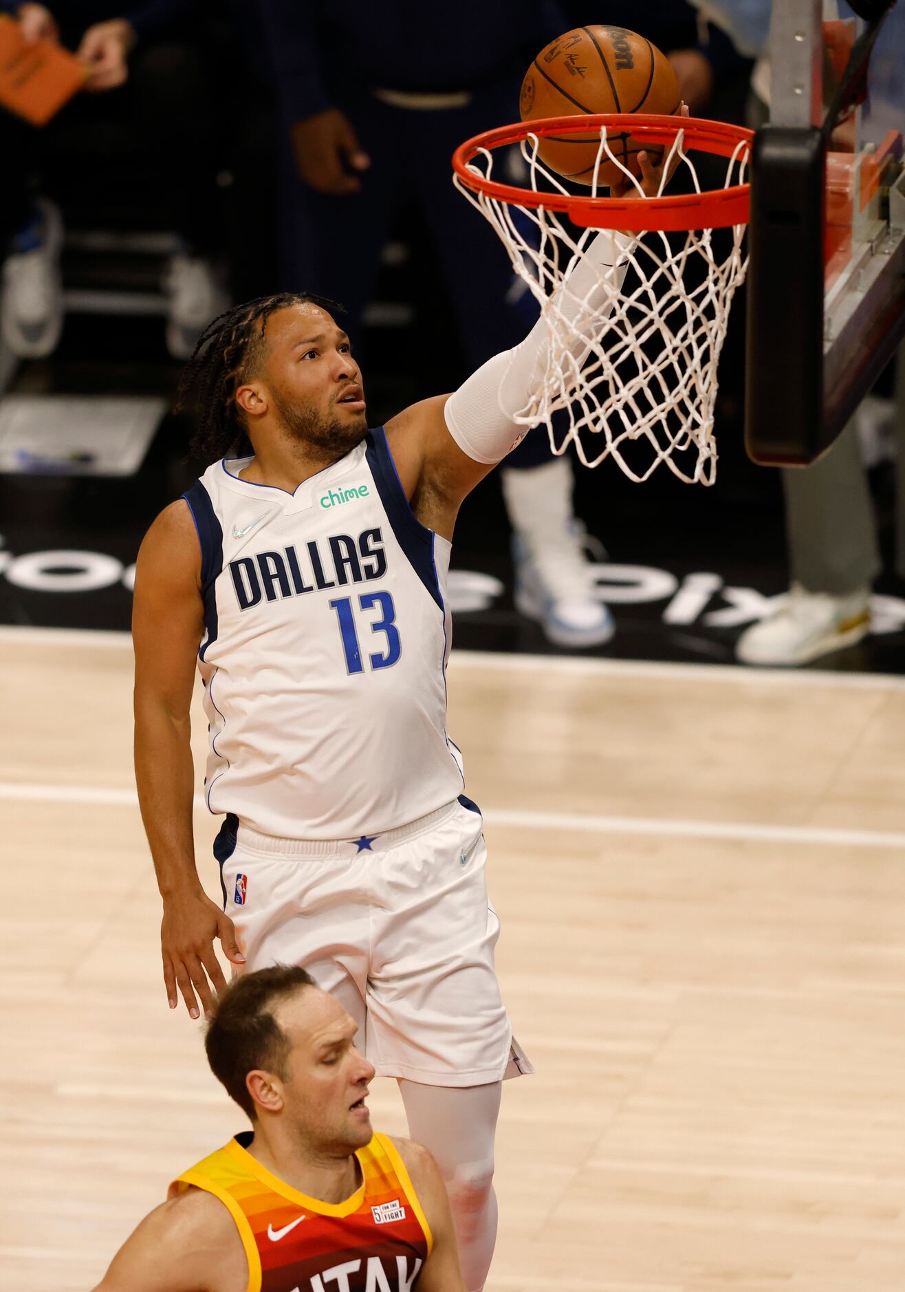 Dallas Mavericks guard Jalen Brunson (13) goes up for a layup as Utah Jazz forward Bojan...