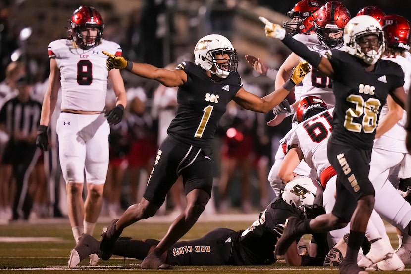 South Oak Cliff defensive back Malik Muhammad (1) celebrates after a Lubbock Cooper turnover...