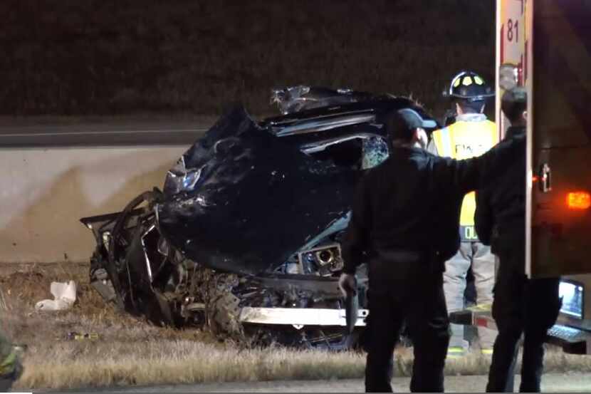 Fort Worth firefighters tend to a one-car wreck that happened on Interstate 35W on Tuesday...