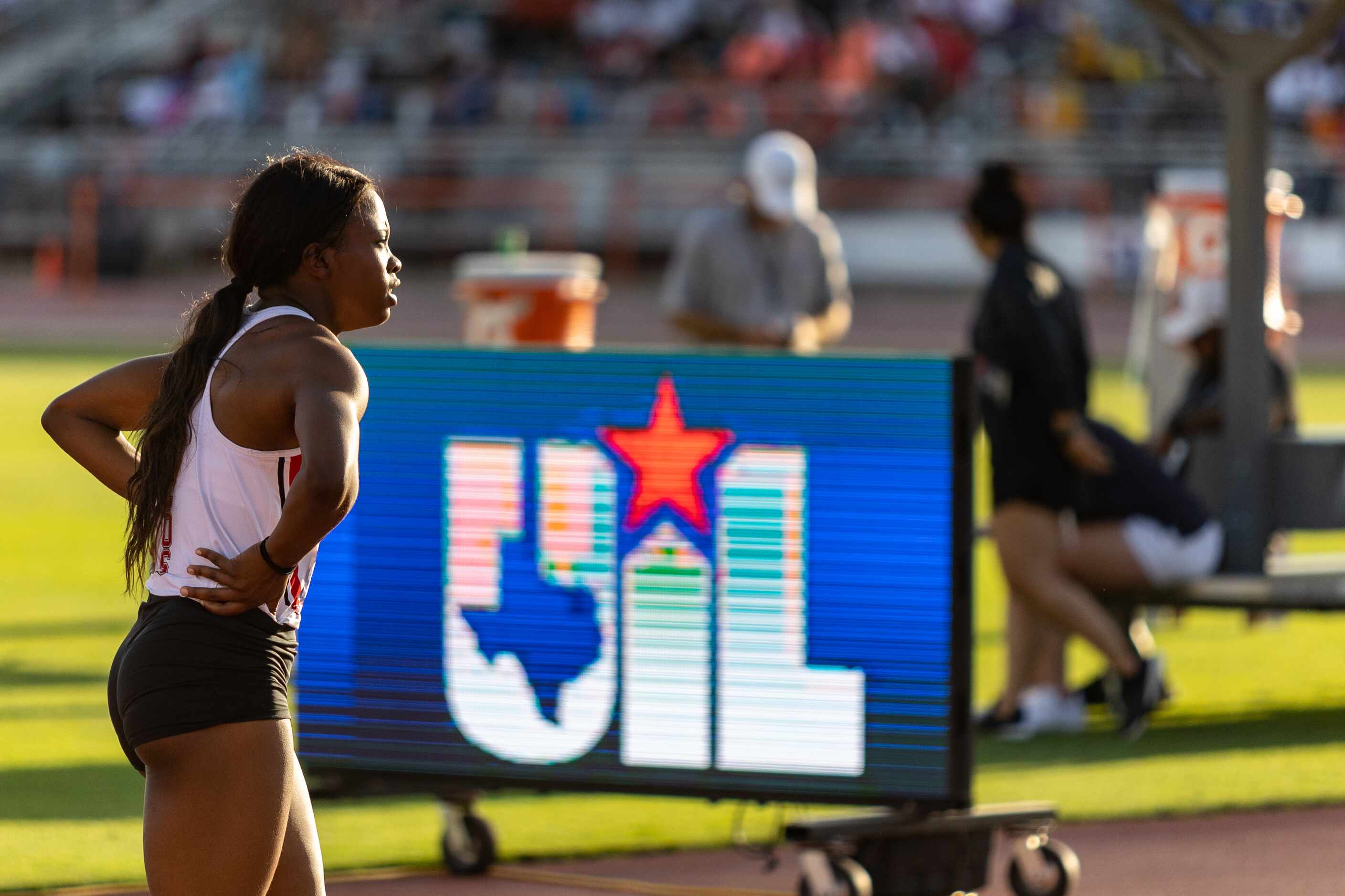 Christine Mallard of Mansfield Legacy walks off the track after the girls’ 400m dash at the...