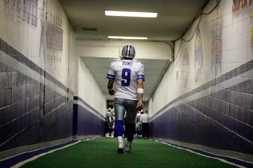 FILE - In this Dec. 20, 2008, file photo, Dallas Cowboys quarterback Tony Romo walks down...