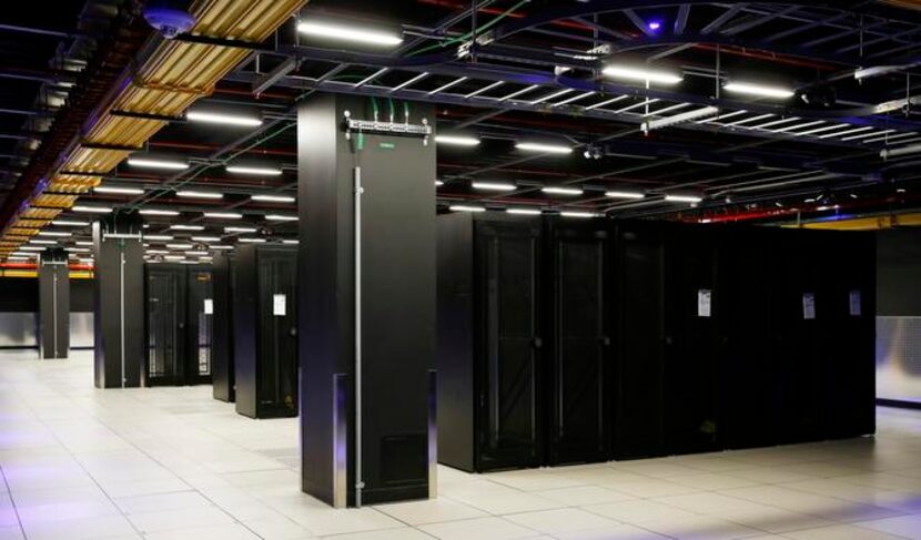 
Cabinets in the Equinix data center stand ready for future clients. The need for data...