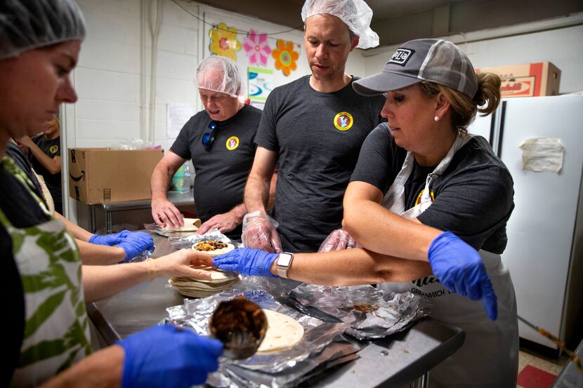 Kurt Anderson (center), Melissa Robertson (right) and other volunteers with Rio Valley...