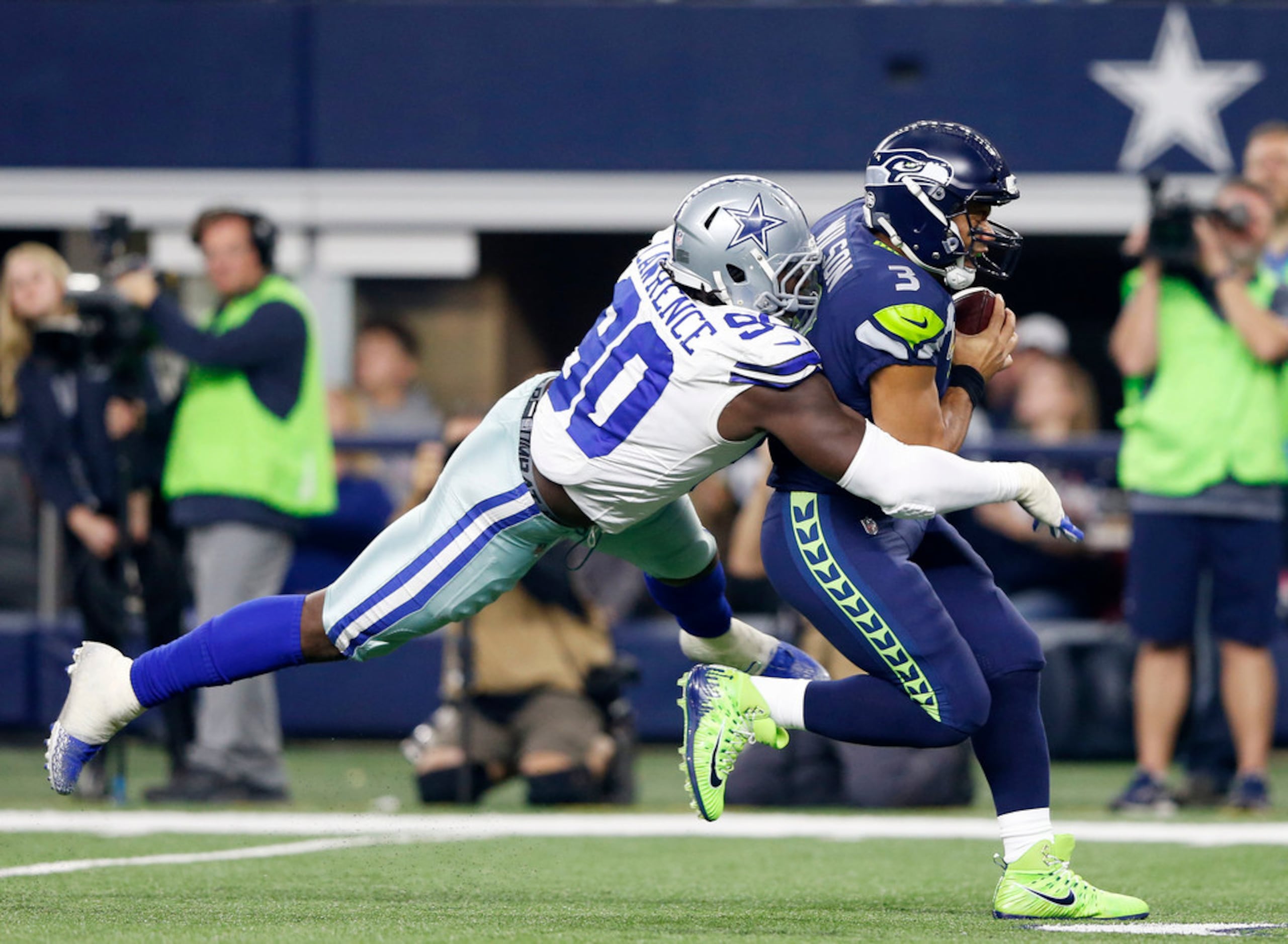 ARLINGTON, TX - DECEMBER 24: A referee signals Dallas Cowboys