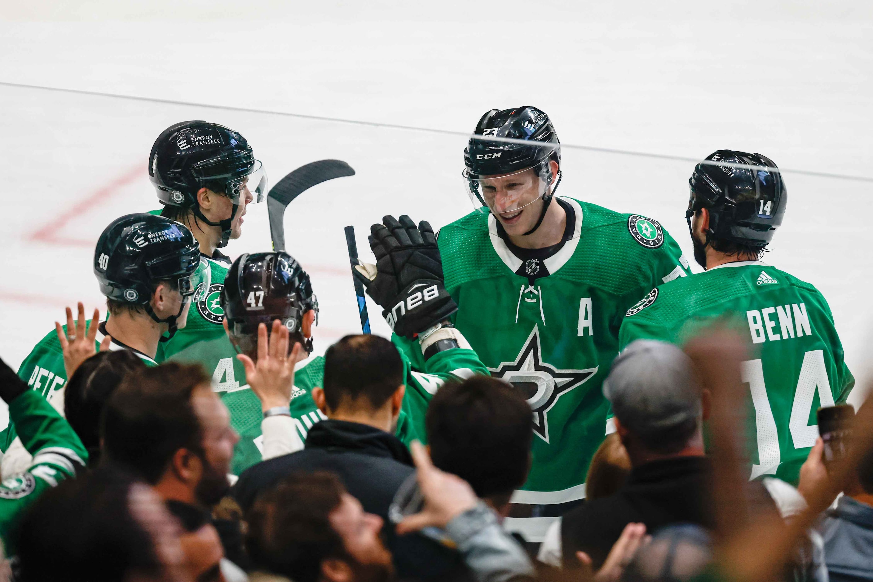 Dallas Stars defenseman Esa Lindell (23), defenseman Miro Heiskanen (4), center Jacob...