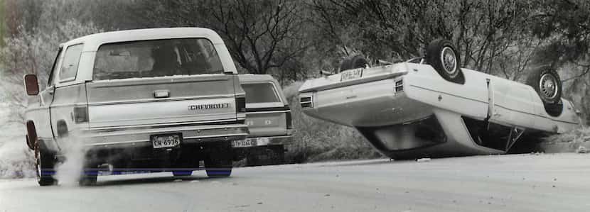 A photo from The News taken Dec. 20, 1983, of a flipped car in Fort Worth.