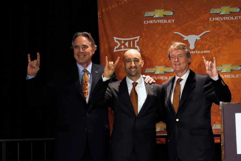 AUSTIN, TX - APRIL 3: (L to R) Texas Athletic Director Steve Patterson, Shaka Smart, and...