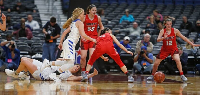  Kailyn Lay follows the ball after stealing it from Kerville's Catherine Kaiser. Kerrville...