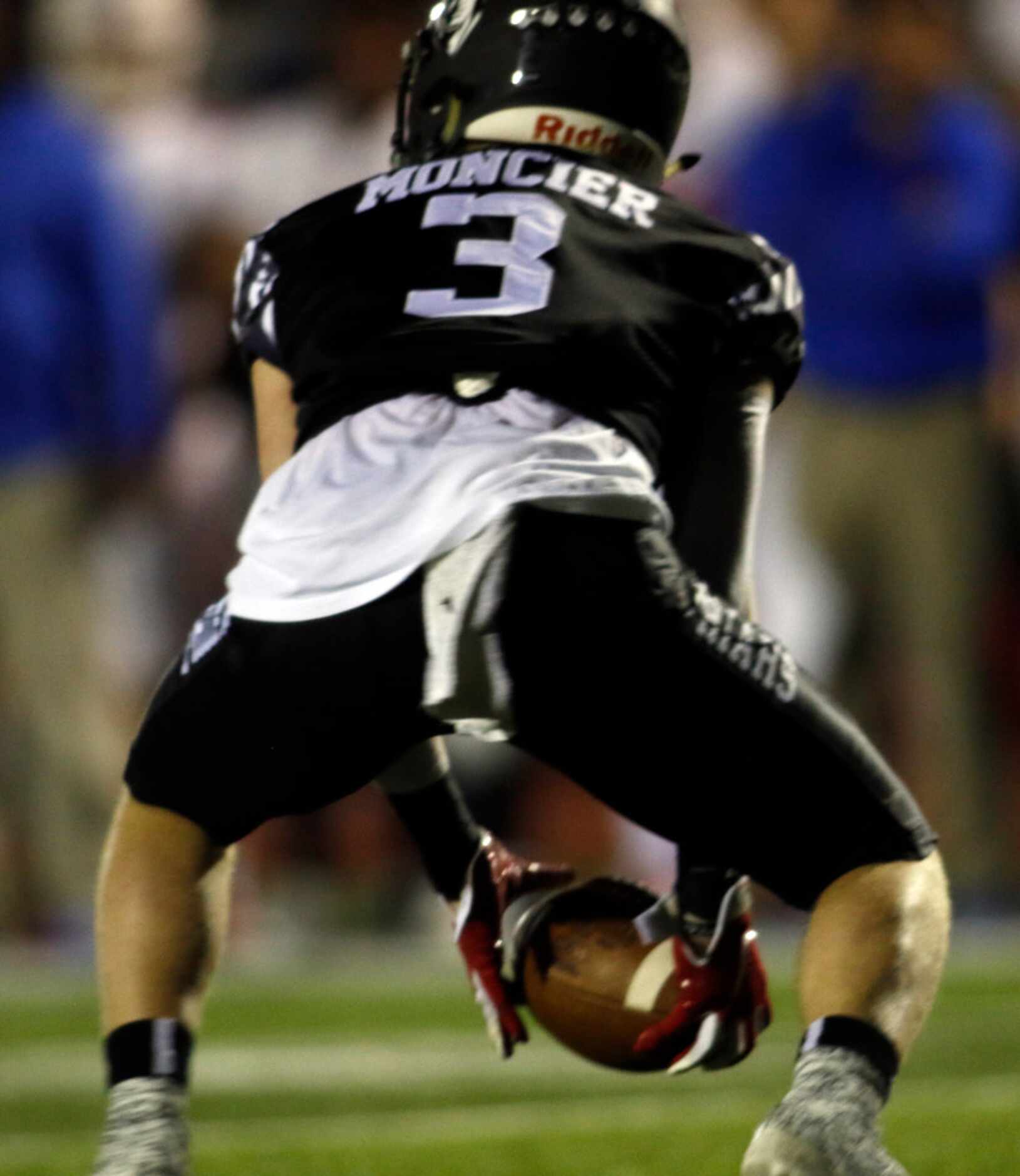 Bishop Lynch receiver Dillon Moncier (3) reaches to scoop a bouncing punt during a first...