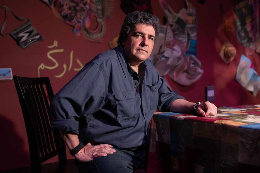 New Teatro Dallas artistic director Gustavo Ott poses on the set of his play "The 22+...