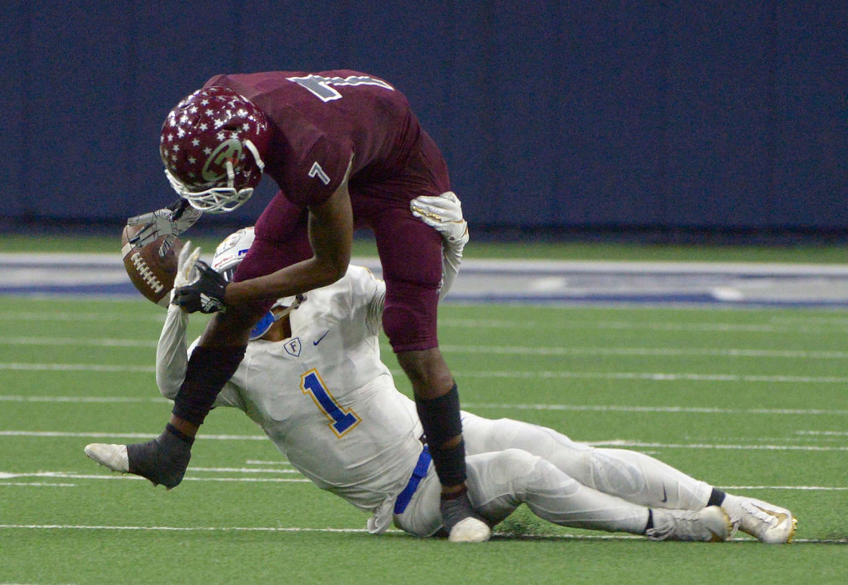 Frisco's Myles Mays (1) breaks up a pass intended for Ennis' Laylon Spencer in the second...