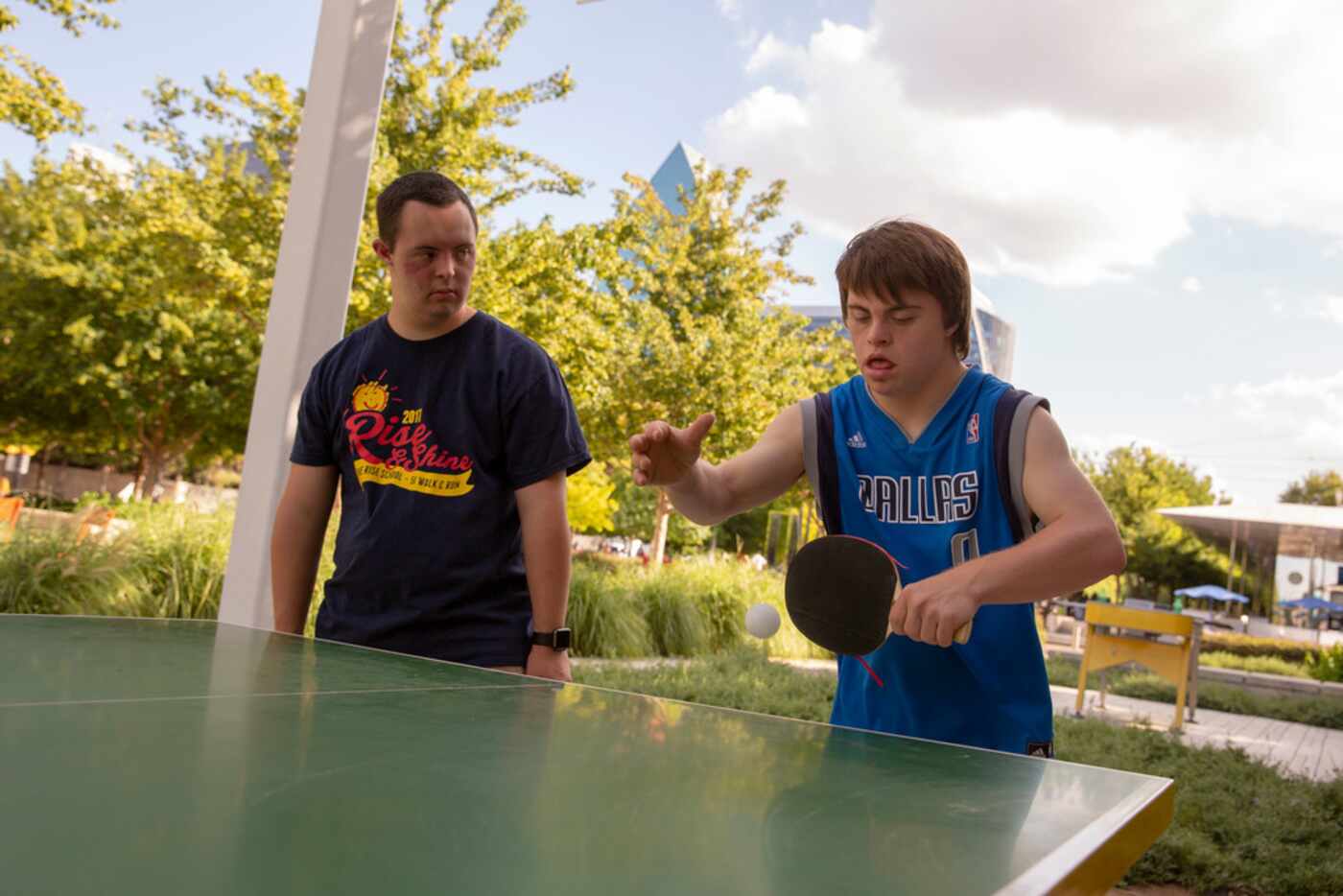 Ben Acker (CQ) (left) and Aidan Easterling (CQ) (right) play table tennis at Klyde Warren...
