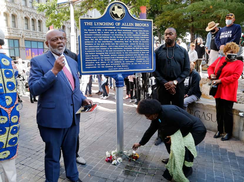 Ed Gray, left, spoke Nov. 20, 2021, during the unveiling of the marker in Pegasus Plaza in...