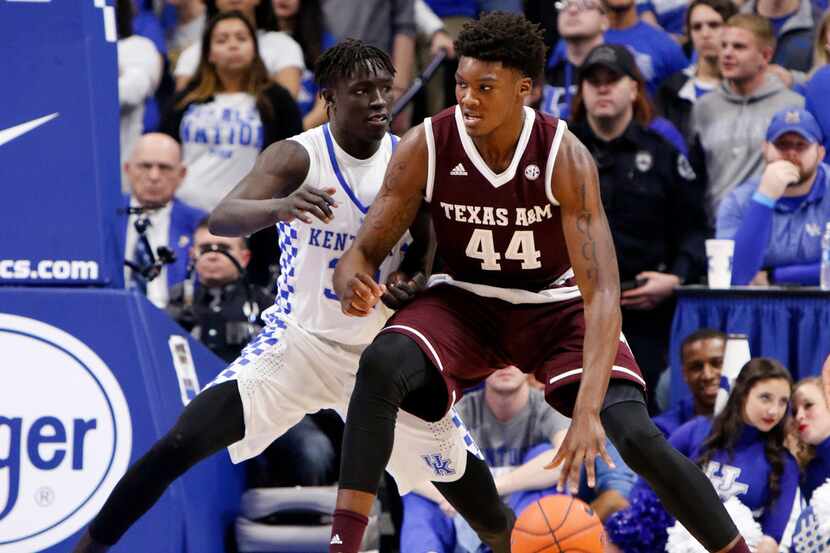 FILE - In this Tuesday, Jan. 3, 2017 file photo, Texas A&M's Robert Williams (44) drives...