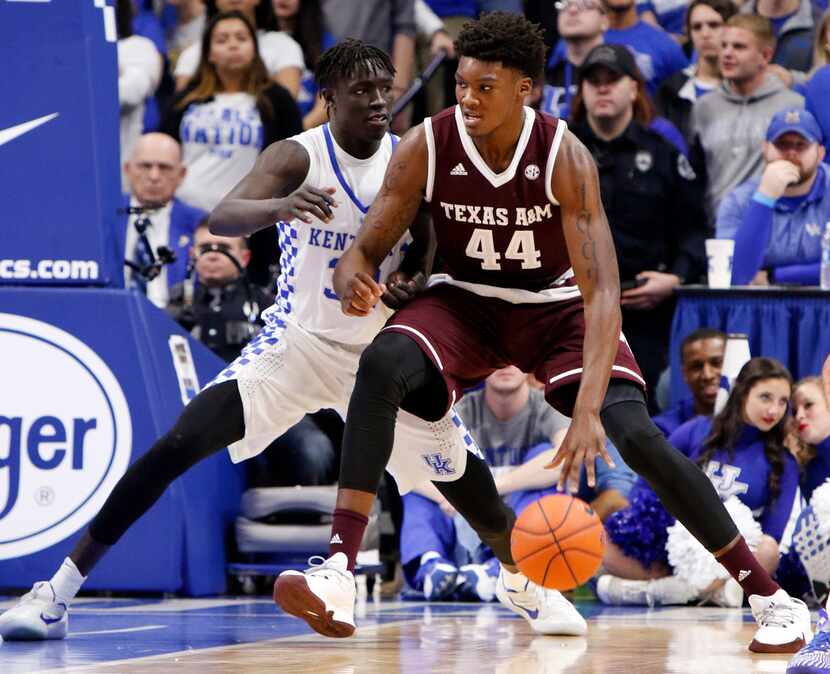 FILE - In this Tuesday, Jan. 3, 2017 file photo, Texas A&M's Robert Williams (44) drives...
