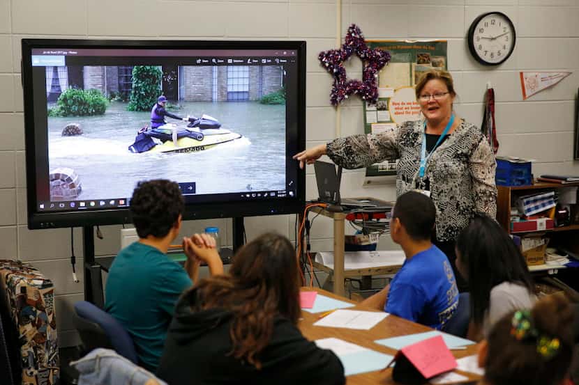 Spring ISD eighth-grade teacher Joan Brandt showed her class a photo of the massive amount...