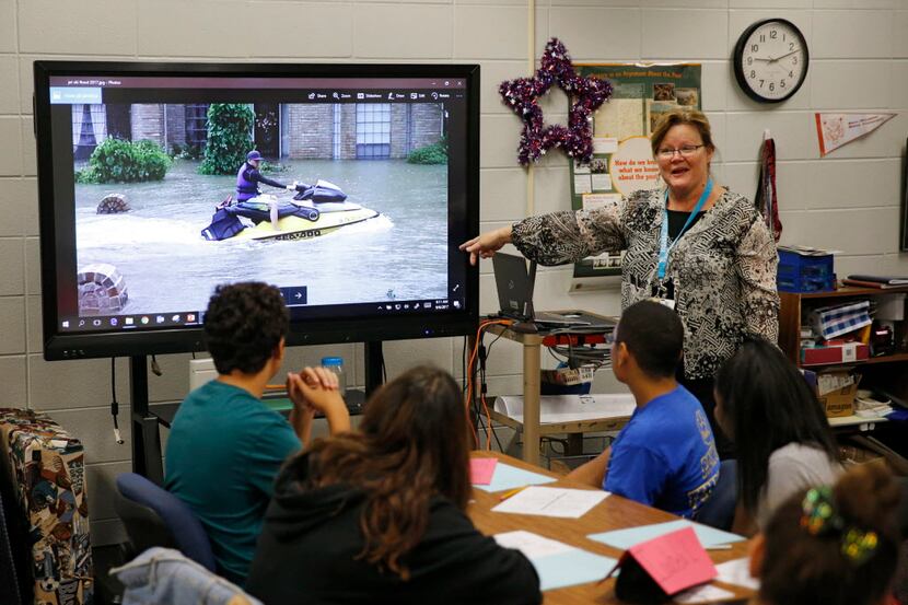 Spring ISD eighth-grade teacher Joan Brandt showed her class a photo of the massive amount...