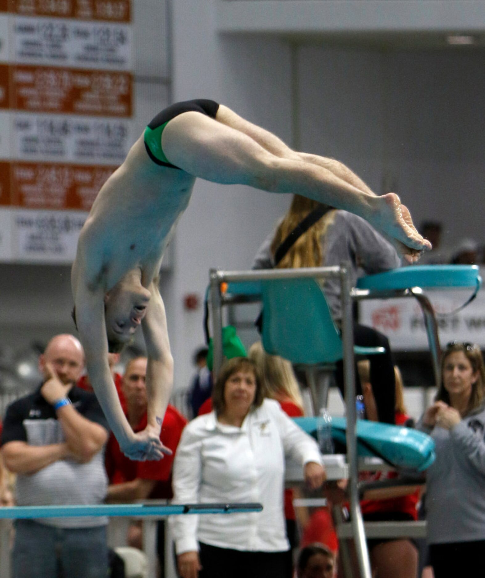 Southlake Carroll's Jackson Miller comes out of a tucked position as he faces a smooth entry...