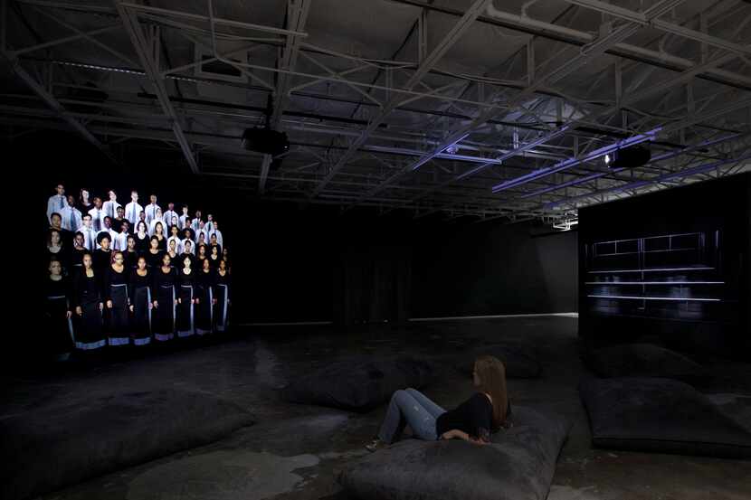 A visitor takes in Gabrielle Goliath's "Chorus" installation at Dallas Contemporary. The...