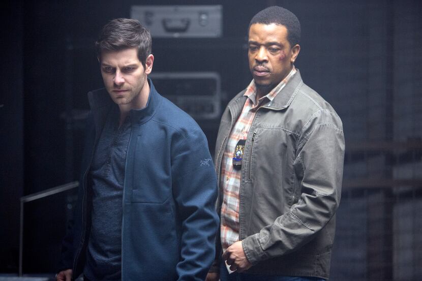 David Giuntoli as Nick Burkhardt, Russell Hornsby as Hank Griffin in "Grimm."
