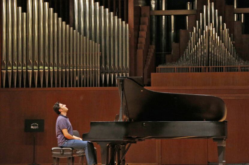 Syrian pianist Amjad Dabi gets ready to play during music class at Baylor University. He...
