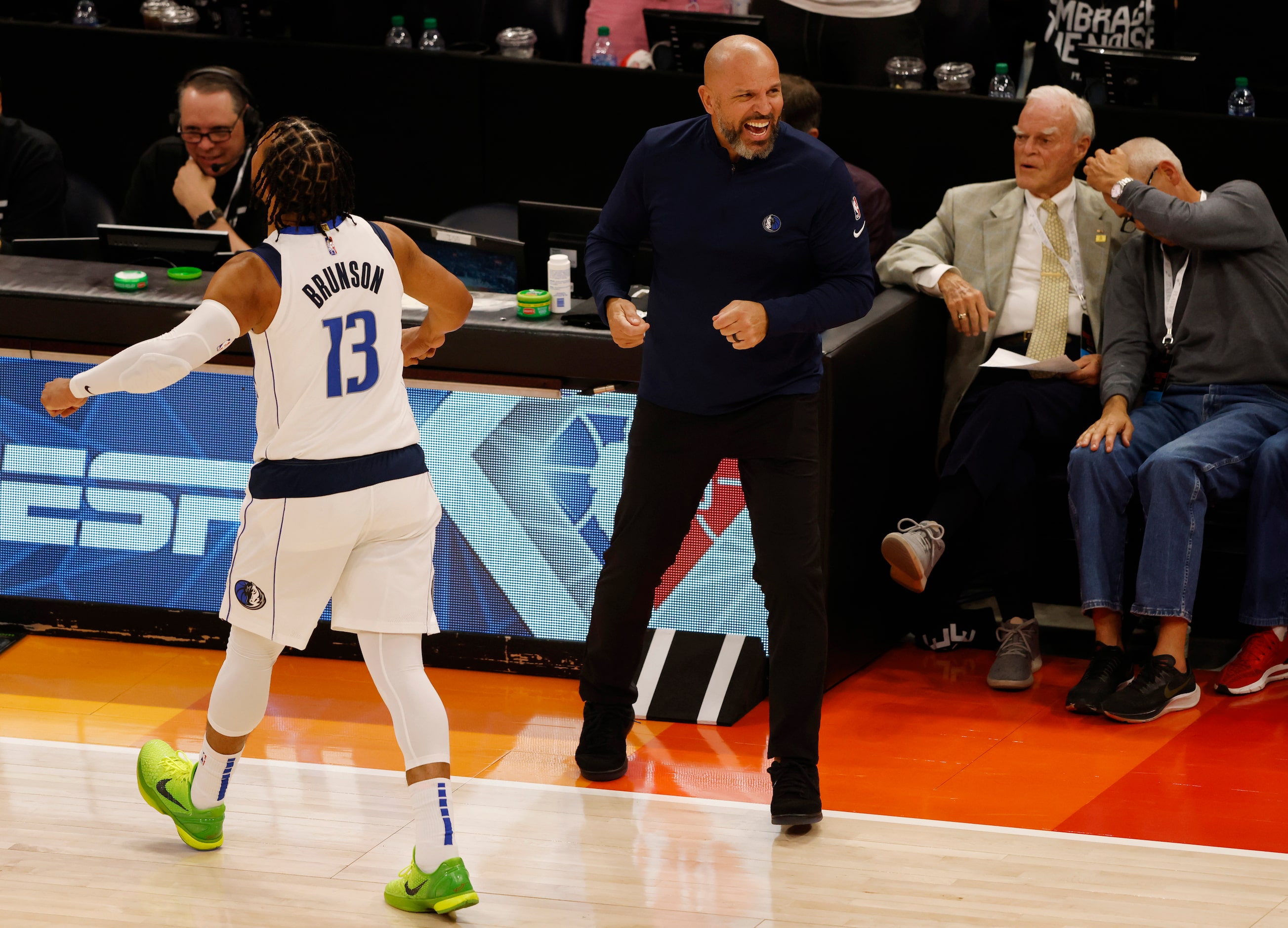 Dallas Mavericks head coach Jason Kidd and Dallas Mavericks guard Jalen Brunson (13)...