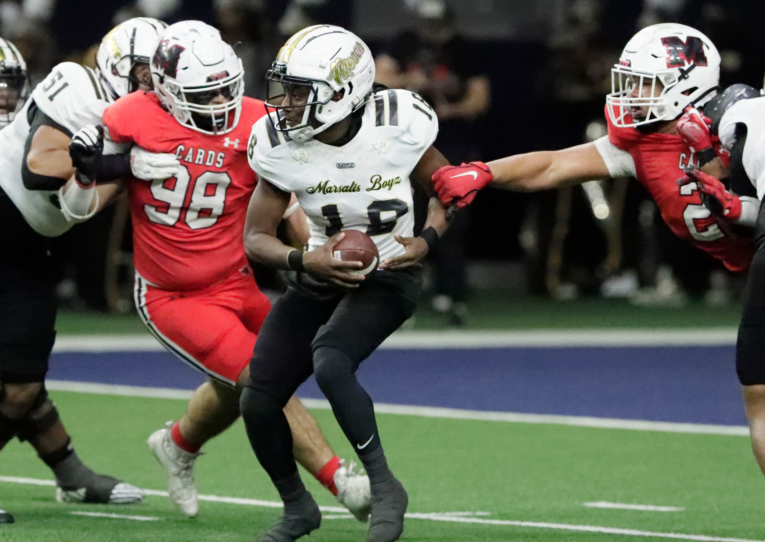 South Oak Cliff High School quarterback William Little (18) runs the ball during the first...