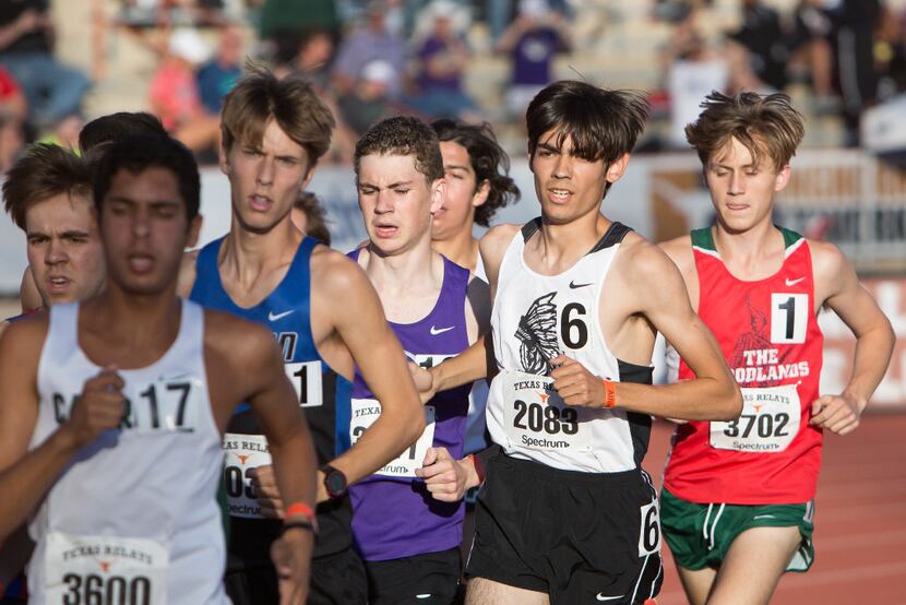 Arlington Martin senior Cade Bethmann, second from right, competes in the Boys 1600 meter...