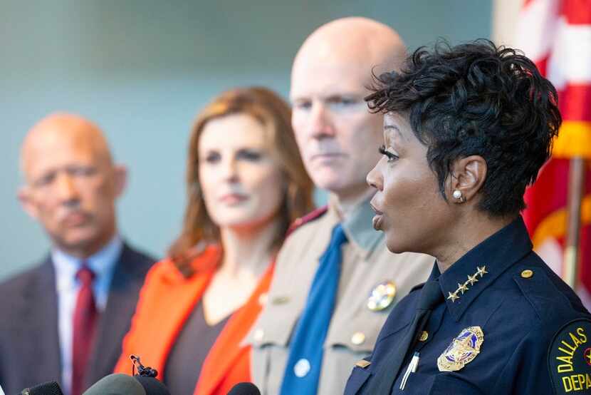Dallas Police Chief U. Renee Hall gives remarks as (from left) Dallas County District...