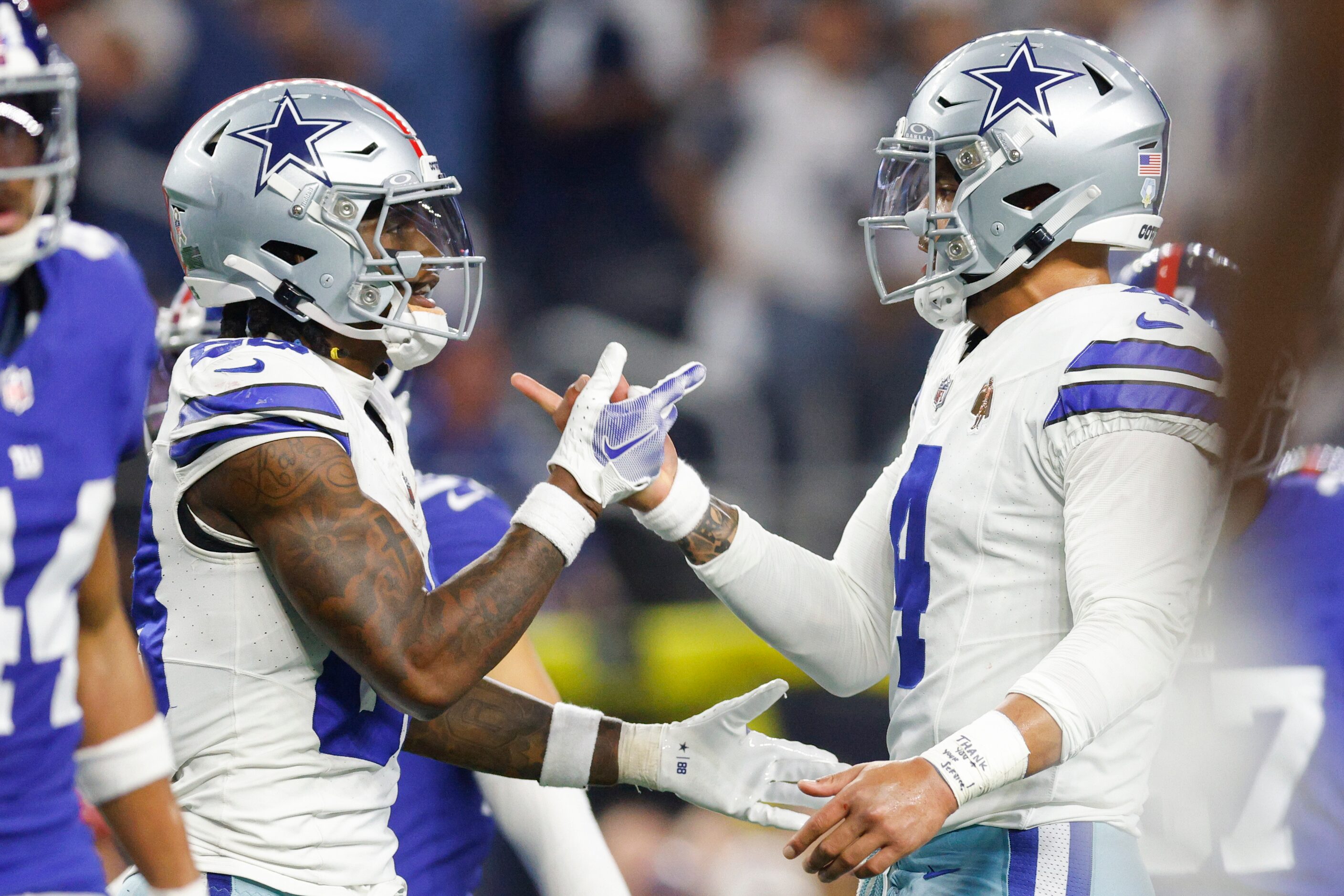 Dallas Cowboys wide receiver CeeDee Lamb (88) celebrates his touchdown reception with...