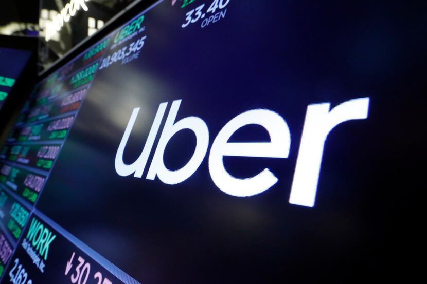 The logo for Uber appeared above a trading post on the floor of the New York Stock Exchange...