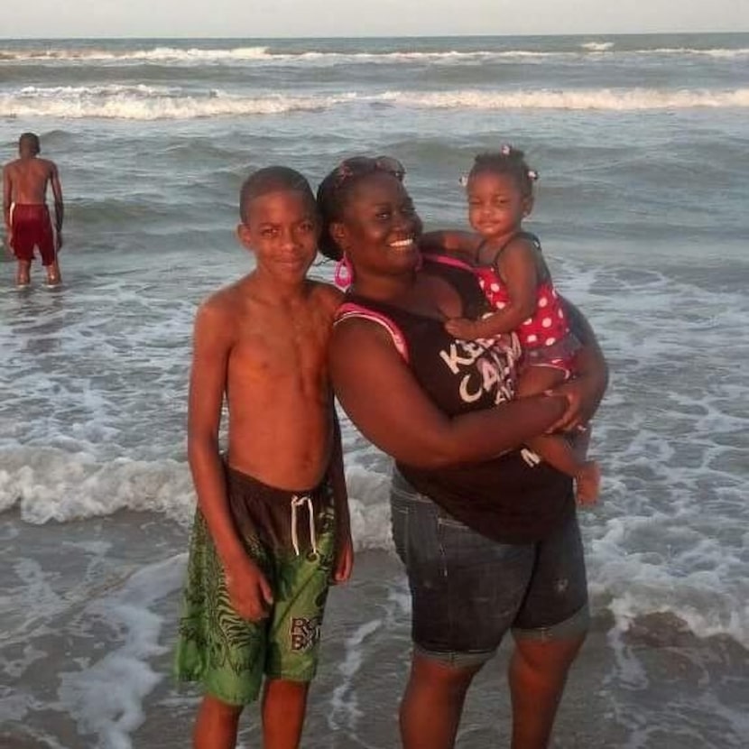 Jordan Edwards (left) with his stepmother, Charmaine Edwards, and his sister Korrie on a...