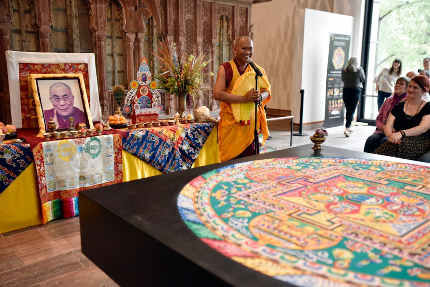 Buddhist monk Geshe Tenzin Phentsok conducts a lecture on Buddhism during the Mystical Arts...