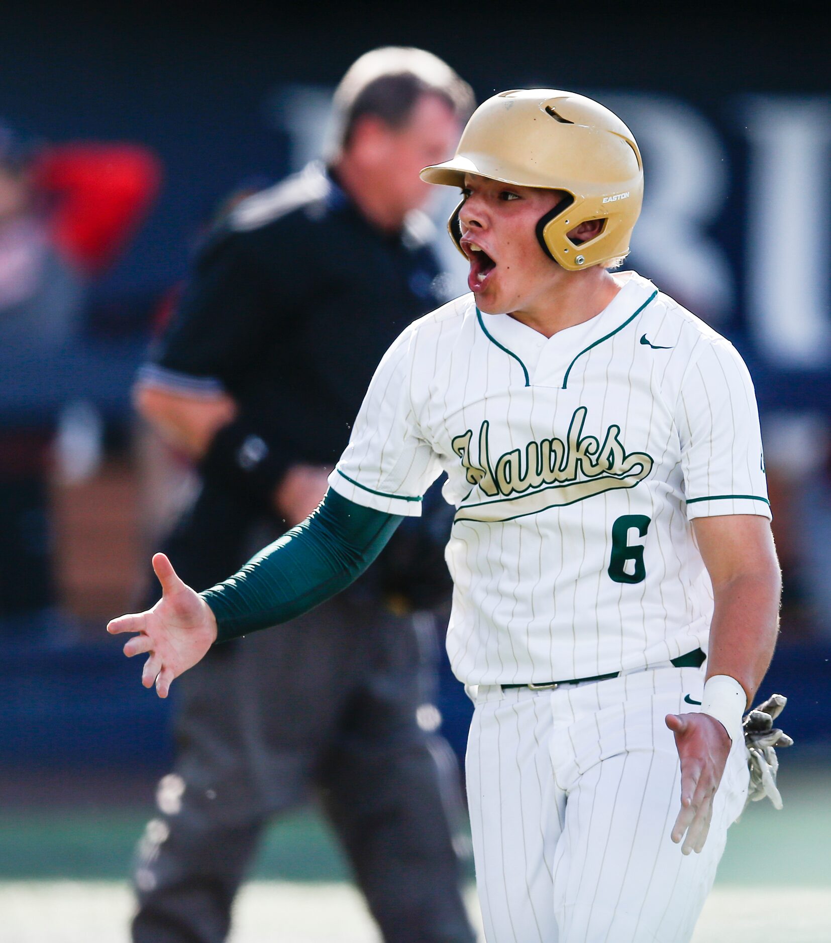 Birdville’s Bynum Martinez (6) celebrates scoring a run during the second inning of a high...