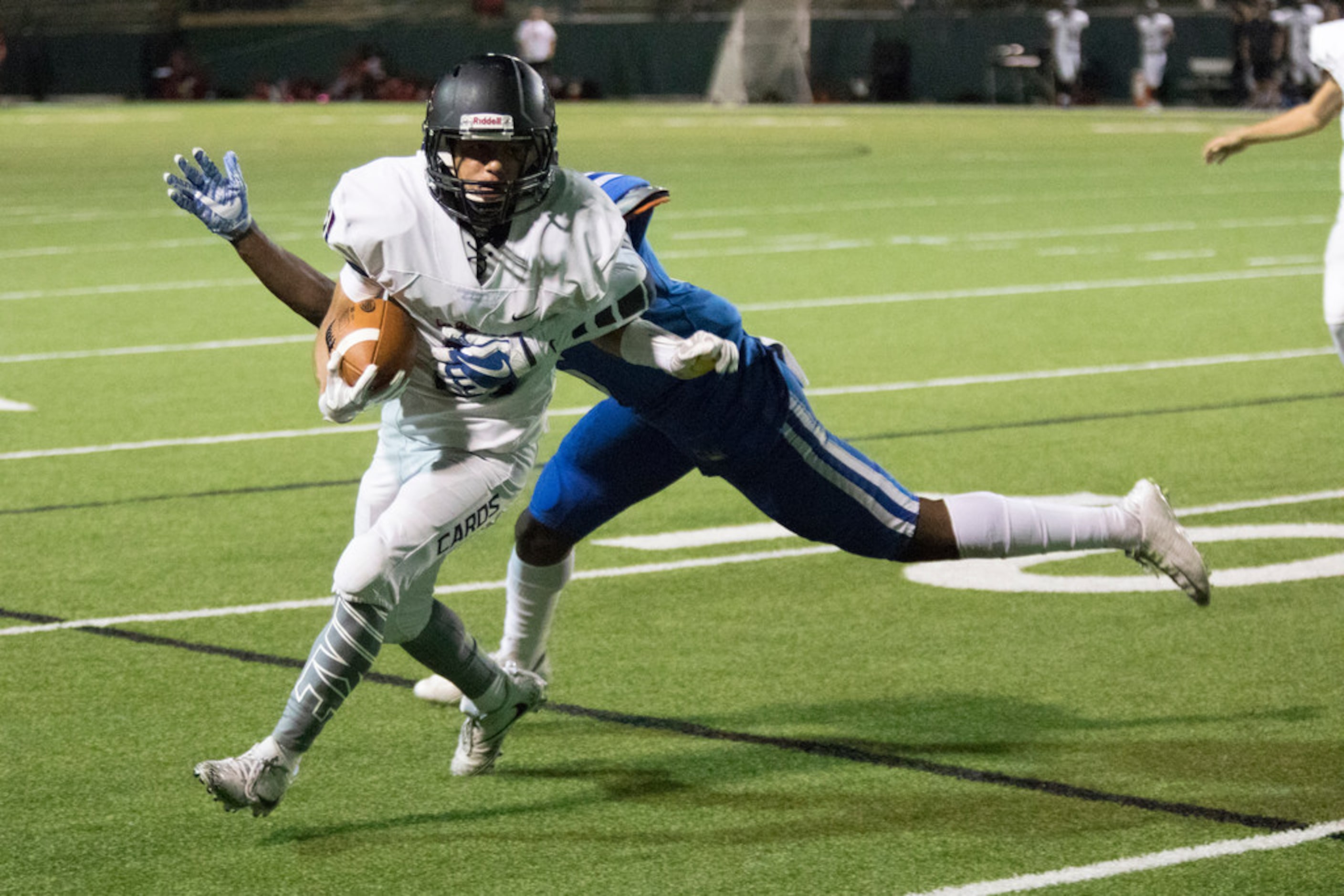 Irving MacArthur attempts a fake field goal during a District 7-6A matchup between Irving...