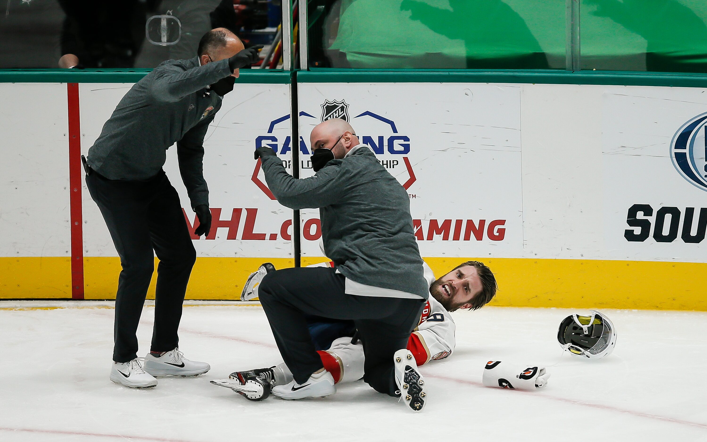 Florida Panthers trainers call for a stretcher after defenseman Aaron Ekblad (5) suffered a...