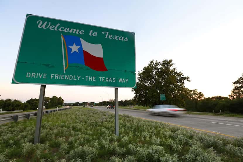 A "Welcome to Texas" sign greets drivers as they enter the Lone Star State on U.S. 75 near...