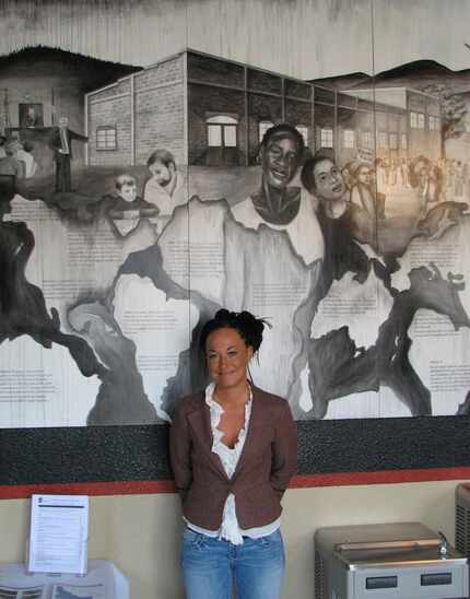 Rachel Dolezal in 2009, in front of a mural she painted at the officers of the the Human...