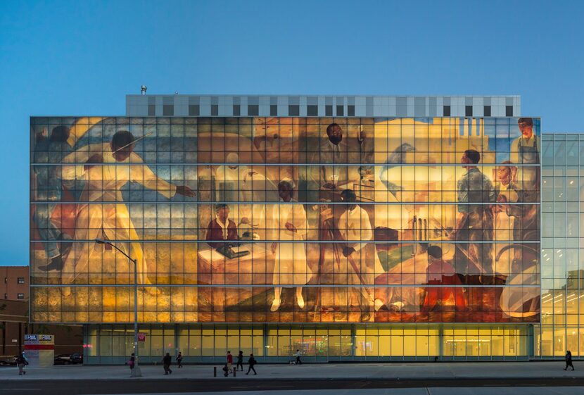 This wall facade along the side of Harlem Hospital replicates three panels from a Works...