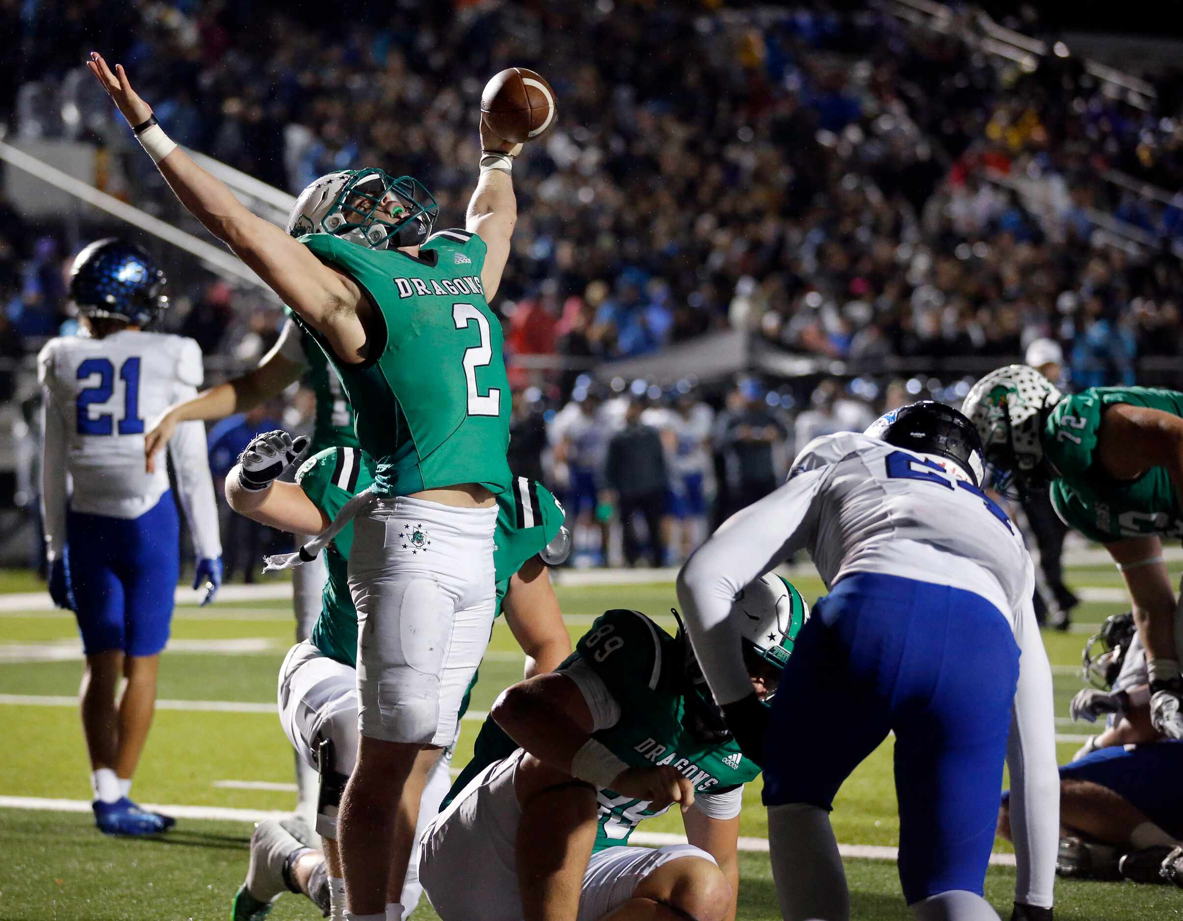 Southlake Carroll running back Owen Allen (2) celebrates his second half touchdown dive...