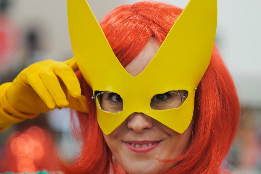 Stephanie Mundt of McKinney dresses as Marvel Girl at Dallas Comic Con Fan Days 2014.